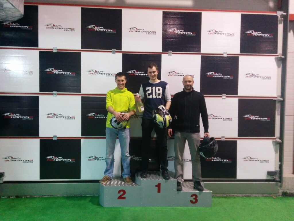 Three winners of a karting competition during team building event