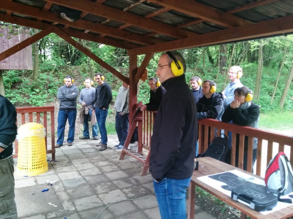 Group of Tronel employees at a team building event at a shooting range